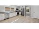 Updated kitchen with white cabinets and stainless steel appliances at 2164 S Catarina --, Mesa, AZ 85202