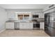 Updated kitchen with white cabinets and stainless steel appliances at 2164 S Catarina --, Mesa, AZ 85202