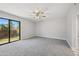 Bedroom with sliding glass door to patio at 2164 S Catarina --, Mesa, AZ 85202