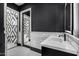 Elegant bathroom with double vanity, marble, and geometric tile at 1480 E Raven Ct, Gilbert, AZ 85297