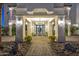 Elegant entryway with a grand chandelier and a view to a courtyard at 1480 E Raven Ct, Gilbert, AZ 85297