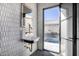 Stylish powder room with hexagon tile and a vintage-style sink at 1480 E Raven Ct, Gilbert, AZ 85297