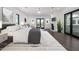 Spacious main bedroom with fireplace, hardwood floors, and access to a private balcony at 1480 E Raven Ct, Gilbert, AZ 85297
