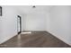 Light and airy bedroom with hardwood floors and a french door at 1480 E Raven Ct, Gilbert, AZ 85297