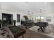 Game room with bar, pool table, and foosball table at 1480 E Raven Ct, Gilbert, AZ 85297