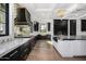 Modern kitchen with black and white design at 1480 E Raven Ct, Gilbert, AZ 85297