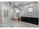 Luxurious bathroom with soaking tub and glass shower at 1480 E Raven Ct, Gilbert, AZ 85297