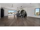 Elegant game room with hardwood floors and modern lighting at 1480 E Raven Ct, Gilbert, AZ 85297