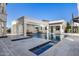 Expansive pool and patio with a water feature at 1480 E Raven Ct, Gilbert, AZ 85297