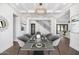 Elegant dining room features a modern table setting and hardwood floors at 1480 E Raven Ct, Gilbert, AZ 85297