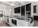 Large kitchen island with marble countertop and modern appliances at 1480 E Raven Ct, Gilbert, AZ 85297