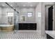 Luxurious bathroom with soaking tub and glass shower at 1480 E Raven Ct, Gilbert, AZ 85297
