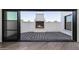 Outdoor patio with fireplace and patterned tile flooring at 1480 E Raven Ct, Gilbert, AZ 85297