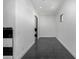 Clean laundry room with hexagon tile floor and access to additional storage at 1480 E Raven Ct, Gilbert, AZ 85297
