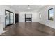 Light and airy bedroom with hardwood floors and access to a private bathroom at 1480 E Raven Ct, Gilbert, AZ 85297