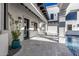 Elegant pool area with a spiral staircase and patio at 1480 E Raven Ct, Gilbert, AZ 85297