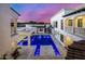 Luxury home with expansive pool and patio; aerial view at 1480 E Raven Ct, Gilbert, AZ 85297