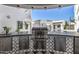 High-end outdoor kitchen with stainless steel appliances and a sink at 1480 E Raven Ct, Gilbert, AZ 85297