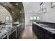 High-end bar featuring marble and a metal accent wall at 1480 E Raven Ct, Gilbert, AZ 85297