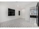 Bright bedroom with patterned tile floor and access to bathroom at 1480 E Raven Ct, Gilbert, AZ 85297