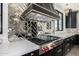 Modern range with herringbone backsplash and gold accents at 1480 E Raven Ct, Gilbert, AZ 85297