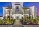 Luxury home exterior with palm trees and stone pathway at 1480 E Raven Ct, Gilbert, AZ 85297