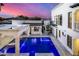 Luxury home with expansive pool and patio; aerial view at 1480 E Raven Ct, Gilbert, AZ 85297
