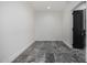 Spacious room with dark gray marble-look tile flooring at 1480 E Raven Ct, Gilbert, AZ 85297