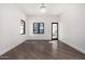 Bright bedroom with hardwood floors and access to backyard at 1480 E Raven Ct, Gilbert, AZ 85297