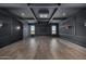 Modern office with dark wood floors and high ceilings at 1480 E Raven Ct, Gilbert, AZ 85297