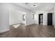 Spacious bedroom with hardwood floors and ensuite bathroom at 1480 E Raven Ct, Gilbert, AZ 85297