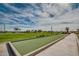 Well-maintained bocce ball courts in a grassy area at 767 E Cobble Stone Dr, Queen Creek, AZ 85140