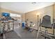 Home gym with treadmill, exercise bike, and weight machine at 6782 W Firebird Dr, Glendale, AZ 85308