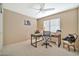 Charming bedroom with workspace and neutral decor at 6782 W Firebird Dr, Glendale, AZ 85308