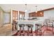 Modern kitchen with stainless steel appliances and an island with seating at 6782 W Firebird Dr, Glendale, AZ 85308