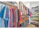 Large walk-in closet with ample shelving and hanging space at 6782 W Firebird Dr, Glendale, AZ 85308