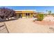 House exterior view with gravel landscaping at 10637 W Welk Dr, Sun City, AZ 85373