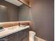 Elegant powder room with double sinks and modern fixtures at 37200 N Cave Creek Rd # 1002, Scottsdale, AZ 85262