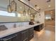 Spa-like bathroom with soaking tub, walk-in shower, and dual vanities at 37200 N Cave Creek Rd # 1002, Scottsdale, AZ 85262