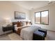 Comfortable bedroom with king-size bed, plush bedding, and ample light at 37200 N Cave Creek Rd # 1002, Scottsdale, AZ 85262