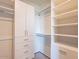 Spacious walk-in closet with ample shelving at 37200 N Cave Creek Rd # 1002, Scottsdale, AZ 85262