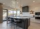 Modern kitchen with an island, stainless steel appliances, and ample counter space at 37200 N Cave Creek Rd # 1002, Scottsdale, AZ 85262