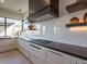 Modern kitchen with gas cooktop and ample counter space at 37200 N Cave Creek Rd # 1002, Scottsdale, AZ 85262