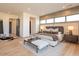 Spacious main bedroom with light oak flooring at 37200 N Cave Creek Rd # 1002, Scottsdale, AZ 85262