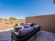 Private patio with outdoor seating and scenic views at 37200 N Cave Creek Rd # 1002, Scottsdale, AZ 85262