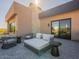 Private patio with outdoor seating and mountain views at 37200 N Cave Creek Rd # 1002, Scottsdale, AZ 85262
