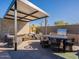 Outdoor patio with seating area, built-in grill, and pergola at 37200 N Cave Creek Rd # 1002, Scottsdale, AZ 85262