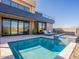 Modern rectangular pool with a spa and lounge chairs at 37200 N Cave Creek Rd # 1002, Scottsdale, AZ 85262
