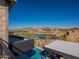 Private pool and lake view from balcony at 37200 N Cave Creek Rd # 1002, Scottsdale, AZ 85262