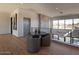 Open upper landing with wood floors, stone wall, and scenic views at 37200 N Cave Creek Rd # 1002, Scottsdale, AZ 85262